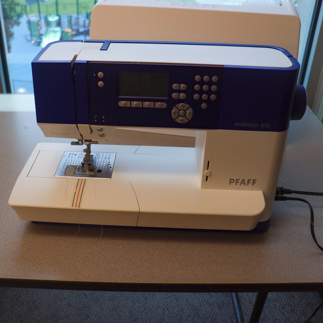Pfaff sewing machine on a counter.