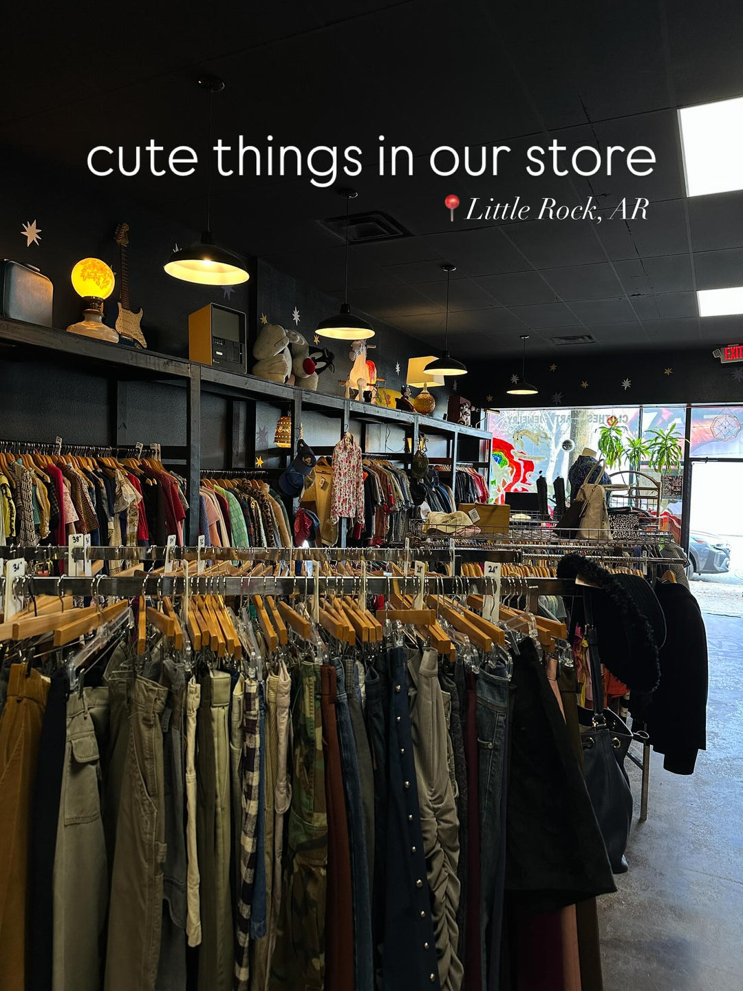 Dog Eat Dog fashion features racks of vintage clothing and accessories.