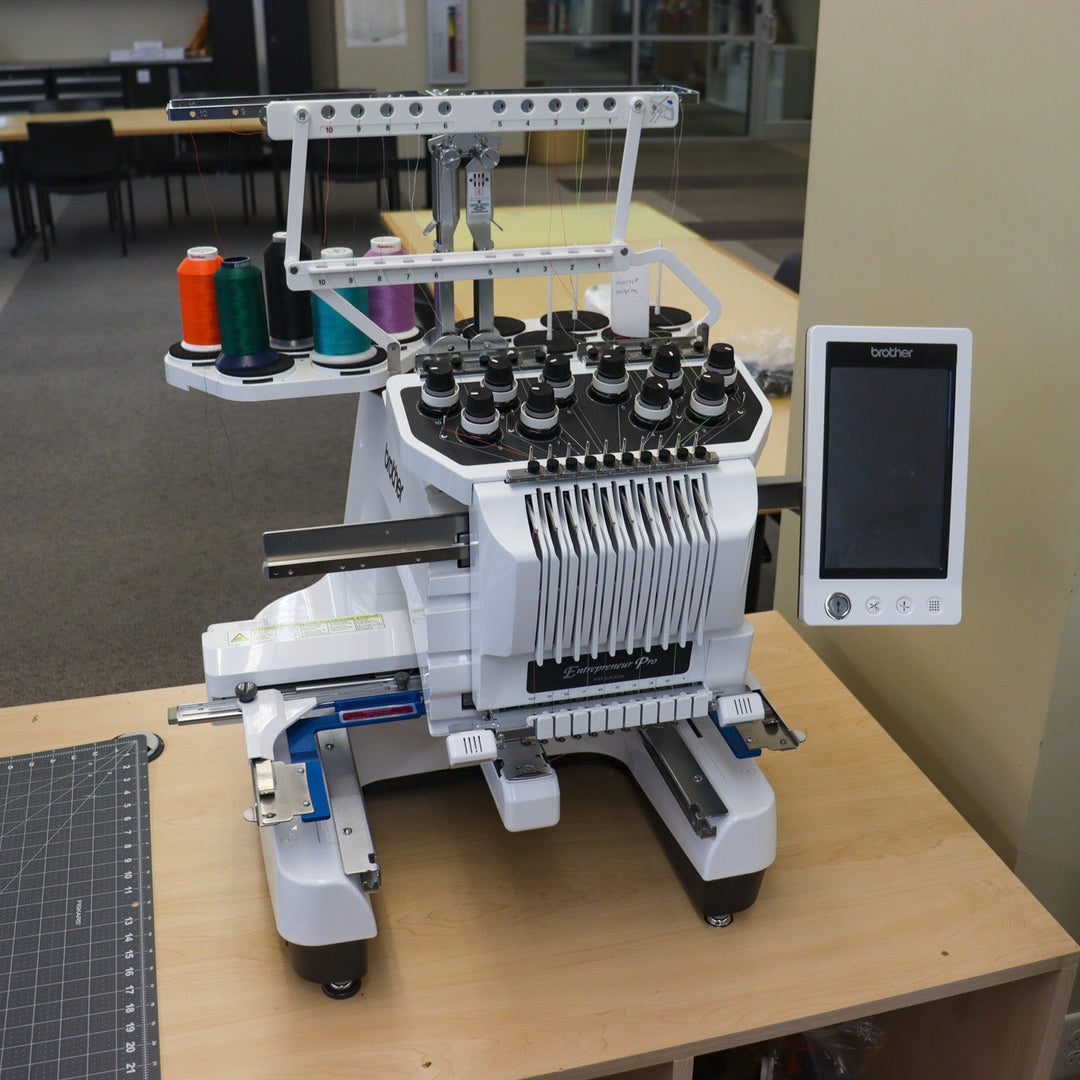 An embroidery machine with colorful thread.
