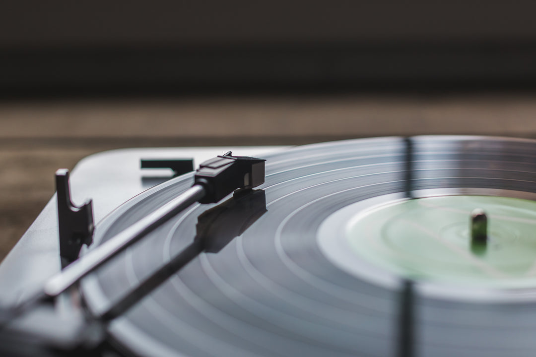 Close-up photo of a record on a turntable.