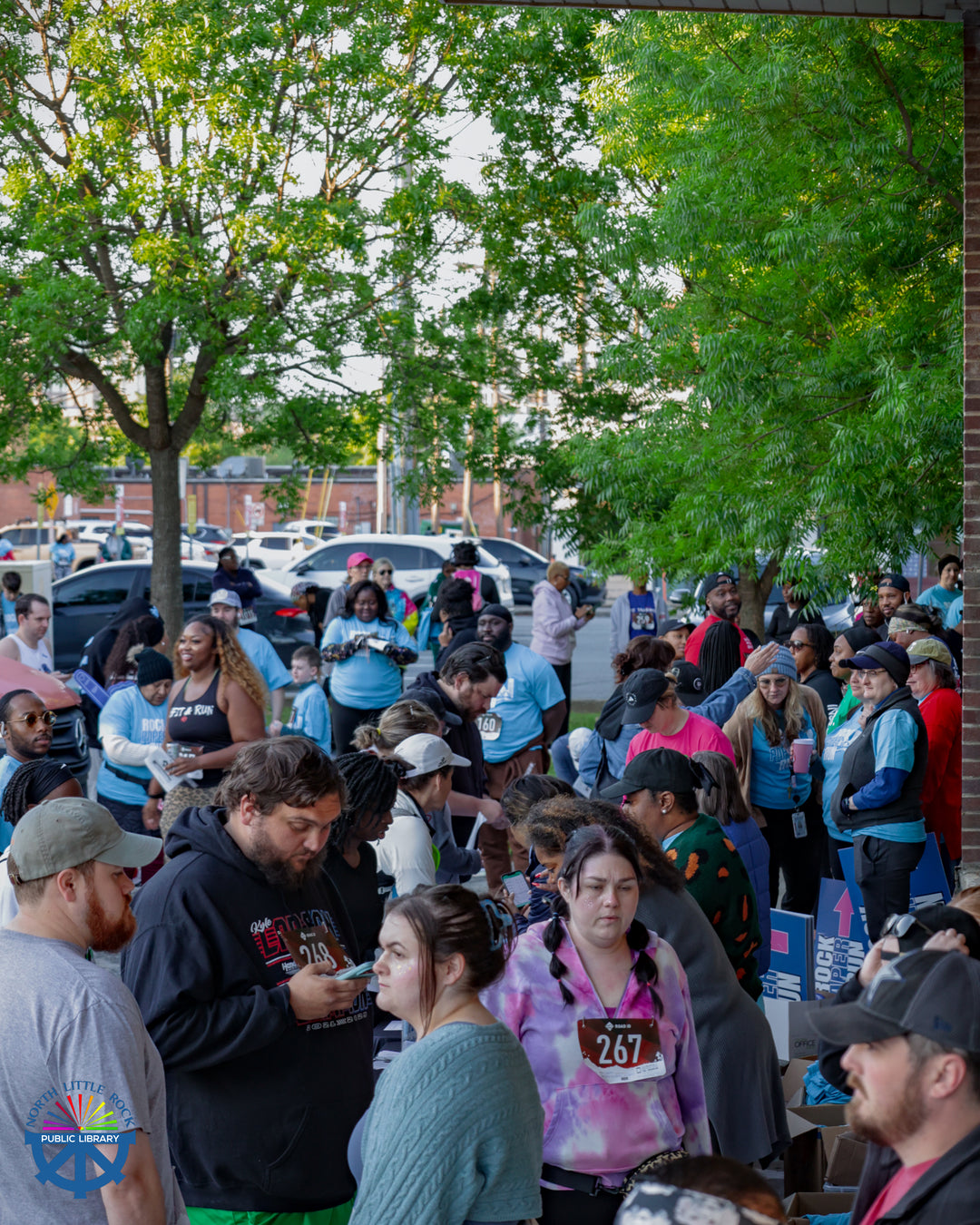 A large group of people wait for the Rock, Paper, Run 5K to begin.
