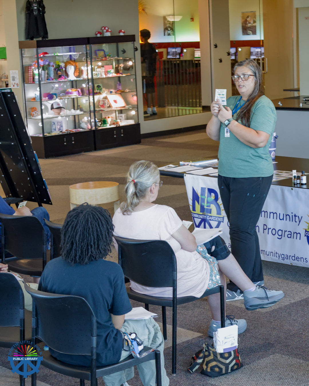 A presenter from the North Little Rock Community Garden program speaks to library patrons about gardening.