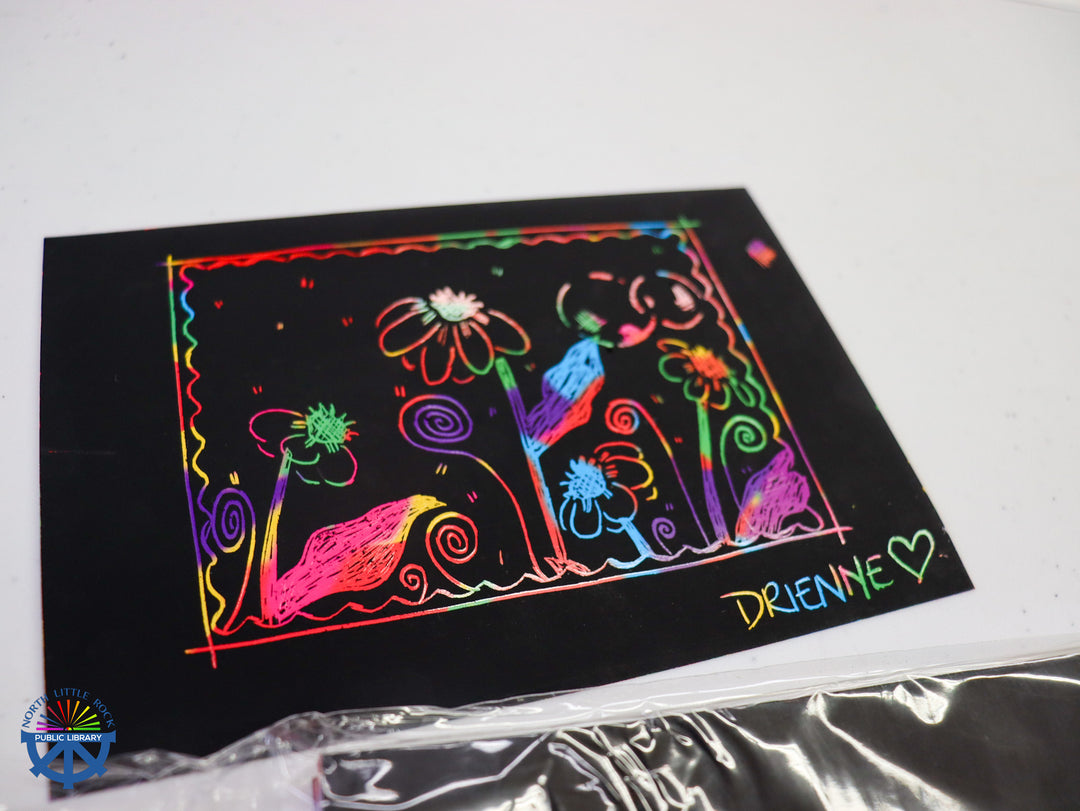 Colorful flowers on a black background, signed by Drienne.